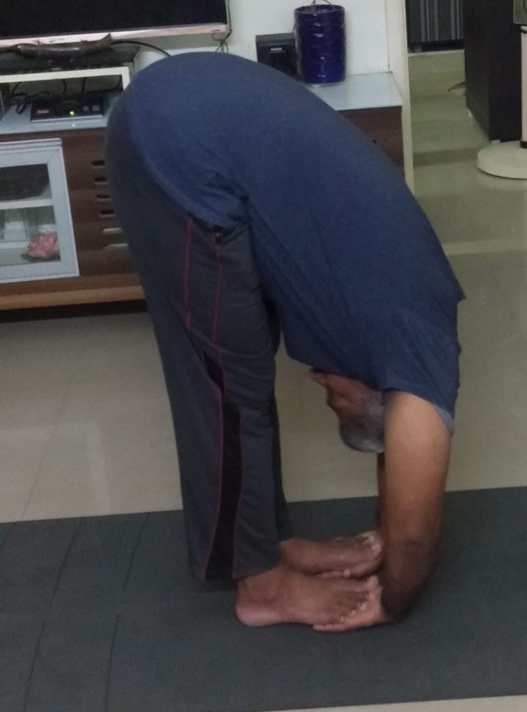 Yoga Pose for Day 4 - Hand Under Foot Pose